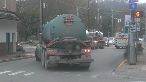 Trucks must turn wide heading west on Rt. 33 (E. 2nd Street) from Main Street. This is Weston's main intersection.