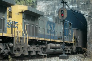 A train hauls coal east as it emerges from the Big Bend Tunnel near Talcott, W.Va.
