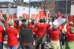 Participants in The People's Foot Rally hold up signs for WV DEP staff to see Photo ©Chuck Wyrostok/AppaLight.com